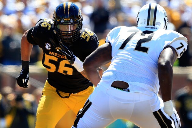 COLUMBIA, MO - SEPTEMBER 13: Defensive lineman Shane Ray #56 of the Missouri Tigers rushes as offensive linesman Torrian Wilson #72 of the UCF Knights tries to block during the game at on September 13, 2014 at Faurot Field in Columbia, Missouri. (Photo by Jamie Squire/Getty Images) COLUMBIA, MO - SEPTEMBER 13: Defensive lineman Shane Ray #56 of the Missouri Tigers rushes as offensive linesman Torrian Wilson #72 of the UCF Knights tries to block during the game at on September 13, 2014 at Faurot Field in Columbia, Missouri. (Photo by Jamie Squire/Getty Images)