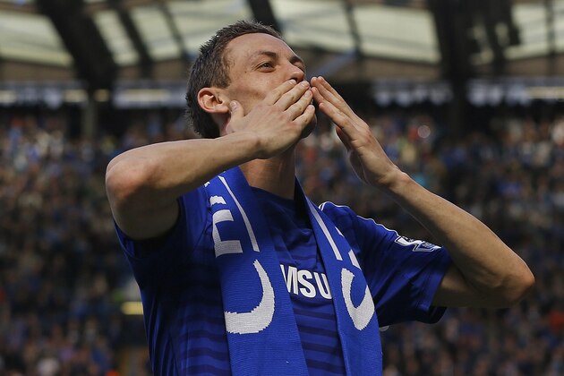 Chelsea's Nemanja Matic and Didier Drogba celebrate after the English Premier League soccer match between Chelsea and Crystal Palace at Stamford Bridge stadium in London, Sunday, May 3, 2015.  Chelsea won the match 1-0 to secure Premier League title with 3 games to spare.  (AP Photo/Kirsty Wigglesworth)