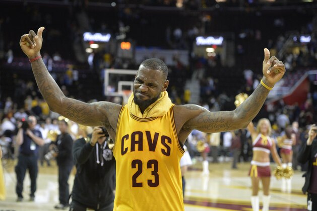 May 12, 2015; Cleveland, OH, USA; Cleveland Cavaliers forward LeBron James (23) celebrates after a 106-101 win over the Chicago Bulls in game five of the second round of the NBA Playoffs at Quicken Loans Arena. Mandatory Credit: David Richard-USA TODAY Sports