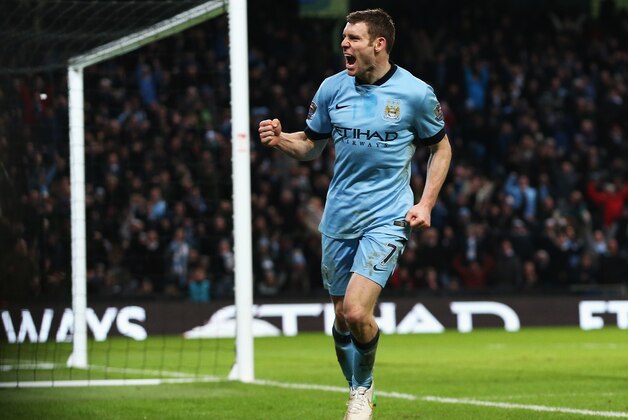 MANCHESTER, ENGLAND - JANUARY 04:  James Milner of Manchester City celebrates after scoring a goal to level the scores at 1-1 during the FA Cup Third Round match between  Manchester City and Sheffield Wednesday at Etihad Stadium on January 4, 2015 in Manchester, England.  (Photo by Jan Kruger/Getty Images)