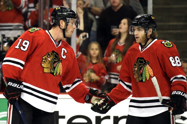 ADVANCE FOR WEEKEND EDITIONS, MAY 15-17 - FILE - In this April 25, 2015, file photo, Chicago Blackhawks center Jonathan Toews, left, celebrates with right wing Patrick Kane after scoring a goal during the first period in Game 6 of an NHL Western Conference hockey playoff series against the Nashville Predators in Chicago. Ryan Getzlaf and Corey Perry broke into the Anaheim Ducks' lineup together and won the Stanley Cup together. So did Chicago's Jonathan Toews and Patrick Kane. (AP Photo/Nam Y. Huh, File)