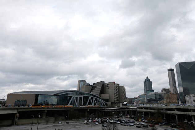 ATLANTA, GA - DECEMBER 06:  A general view of Philips Arena next to the CNN Center in downtown Atlanta prior to the game between the Atlanta Hawks and the Cleveland Cavaliers on December 6, 2013 in Atlanta, Georgia.  NOTE TO USER: User expressly acknowledges and agrees that, by downloading and or using this photograph, User is consenting to the terms and conditions of the Getty Images License Agreement.  (Photo by Kevin C. Cox/Getty Images)