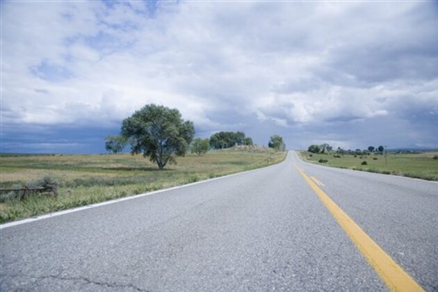 Open road on Route 62 Colorado USA (Photo by: Tetra Images/AP Images)