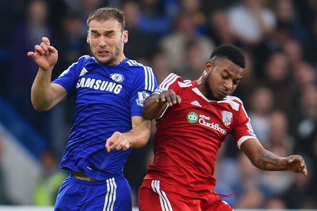 LONDON, ENGLAND - NOVEMBER 22:  Branislav Ivanovic of Chelsea and Stephane Sessegnon of West Brom go up for the header during the Barclays Premier League match between Chelsea and West Bromwich Albion at Stamford Bridge on November 22, 2014 in London, England.  (Photo by Tom Dulat/Getty Images)