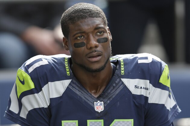 Seattle Seahawks cornerback Byron Maxwell is sits on a cart as he is taken off the field after being injured in the first half of an NFL football game against the Dallas Cowboys on Sunday, Oct. 12, 2014, in Seattle. (AP Photo/Scott Eklund)