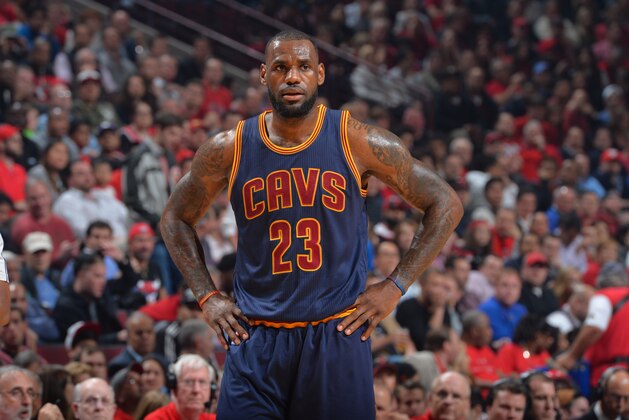 CHICAGO,IL : LeBron James #23 of the Cleveland Cavaliers looks on against the Chicago Bulls at the United Center During Game Six of the Eastern Conference Semifinals during the 2015 NBA Playoffs on May 14, 2015 in Chicago,Illinois NOTE TO USER: User expressly acknowledges and agrees that, by downloading and/or using this Photograph, user is consenting to the terms and conditions of the Getty Images License Agreement. Mandatory Copyright Notice: Copyright 2015 NBAE (Photo by Jesse D. Garrabrant/NBAE via Getty Images)