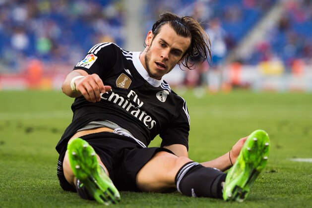 BARCELONA, SPAIN - MAY 17: Gareth Bale of Real Madrid CF lies on the ground during the La Liga match between RCD Espanyol and Real Madrid CF at Cornella-El Prat Stadium on May 17, 2015 in Barcelona, Spain. (Photo by Alex Caparros/Getty Images)