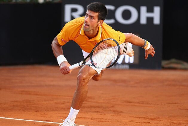 ROME, ITALY - MAY 17:  Novak Djokovic of Serbia in action during the Men's Singles Final against Roger Federer of Switzerland on Day Eight of The Internazionali BNL d'Italia 2015 at the Foro Italico on May 17, 2015 in Rome, Italy.  (Photo by Ian Walton/Getty Images)