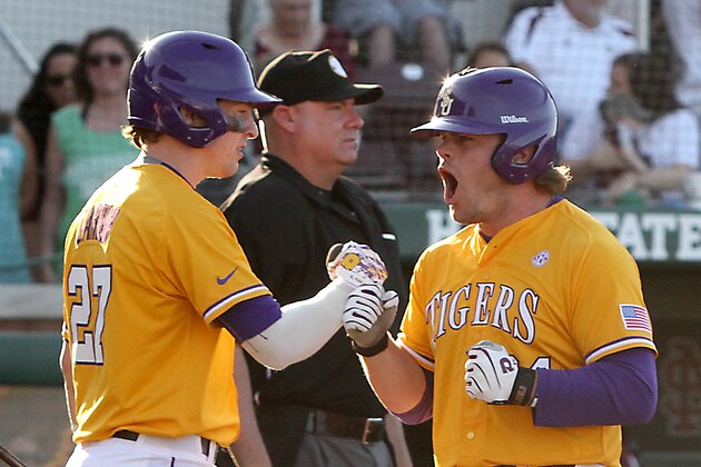 LSU's Beau Jordan, right celebrates the tying run in the ninth inning with Danny Zardon, (27) during their NCAA college baseball game against Mississippi State in Starkville, Miss., Saturday, May. 2, 2015. (AP Photo/Jim Lytle)