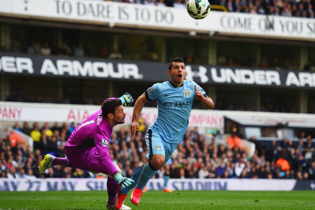 LONDON, ENGLAND - MAY 03:  Sergio Aguero of Manchester City evades Hugo Lloris of Spurs during the Barclays Premier League match between Tottenham Hotspur and Manchester City at White Hart Lane on May 3, 2015 in London, England.  (Photo by Shaun Botterill/Getty Images)