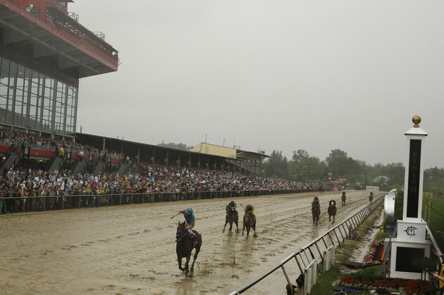 American Pharoah, ridden by Victor Espinoza  wins the 140th Preakness Stakes horse race at Pimlico Race Course, Saturday, May 16, 2015, in Baltimore. (AP Photo/Matt Slocum)
