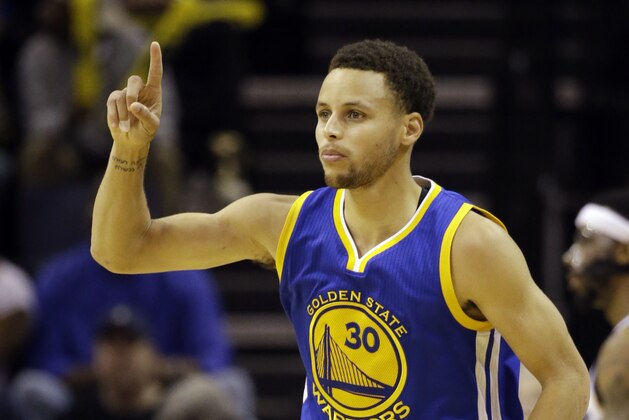 Golden State Warriors guard Stephen Curry gestures during the second half of Game 6 of a second-round NBA basketball Western Conference playoff series against the Memphis Grizzlies, Friday, May 15, 2015, in Memphis, Tenn. (AP Photo/Mark Humphrey)