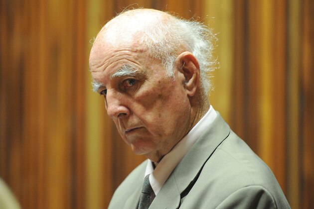 Retired tennis player Bob Hewitt sits in the dock in a court east of Johannesburg, South Afirca, Monday, March 23, 2015. Hewitt, a former Grand Slam doubles tennis champion, was convicted in a South African court of rape and sexual assault decades after the alleged assaults. (AP Photo)