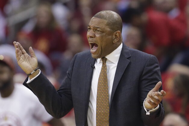 Los Angeles Clippers' Doc Rivers questions a call during the first half in Game 5 of the NBA basketball Western Conference semifinals against the Houston Rockets Tuesday, May 12, 2015, in Houston. (AP Photo/David J. Phillip)