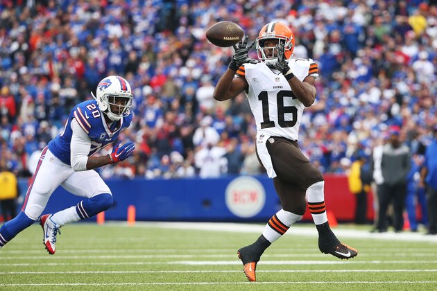 ORCHARD PARK, NY - NOVEMBER 30:   Andrew Hawkins #16 of the Cleveland Browns makes a catch as Corey Graham #20 of the Buffalo Bills defends during the first half at Ralph Wilson Stadium on November 30, 2014 in Orchard Park, New York.  (Photo by Tom Szczerbowski/Getty Images)