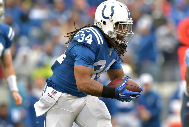 Dec 28, 2014; Nashville, TN, USA; Indianapolis Colts running back Trent Richardson (34) carries the ball against the Tennessee Titans during the first half at LP Field. Mandatory Credit: Don McPeak-USA TODAY Sports