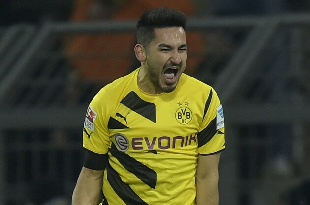 Dortmund's Ilkay Gundogan celebrates his goal during the German Bundesliga soccer match between Borussia Dortmund and TSG Hoffenheim in Dortmund,  Germany, Friday, Dec. 5, 2014. (AP Photo/Martin Meissner)