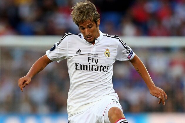 CARDIFF, WALES - AUGUST 12:  Fabio Coentrao of Real Madrid controls the ball during the UEFA Super Cup between Real Madrid and Sevilla FC at Cardiff City Stadium on August 12, 2014 in Cardiff, Wales.  (Photo by Clive Mason/Getty Images)