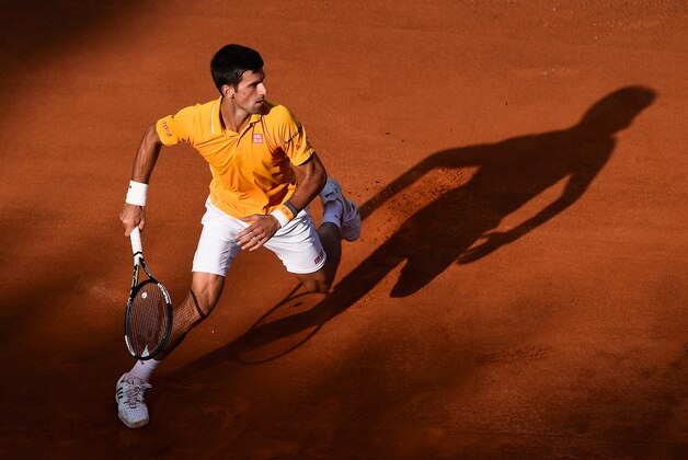 ROME, ITALY - MAY 17:  Novak Djokovic of Serbia in action during his victory over Roger Federer of Switzerland in the Men's Singles Final on Day Eight of The Internazionali BNL d'Italia 2015 at the Foro Italico on May 17, 2015 in Rome, Italy.  (Photo by Mike Hewitt/Getty Images)