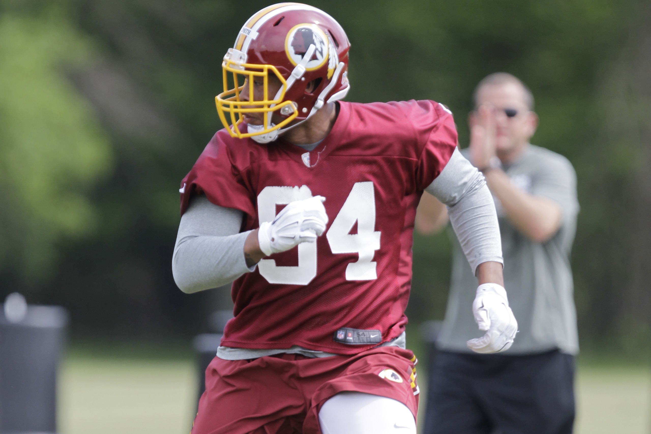 Washington Redskins linebacker and second round draft pick Preston Smith workouts during the second session of the day at NFL football rookie minicamp, Saturday, May 16, 2015, at Redskins Park in Ashburn, Va. (AP Photo/Luis M. Alvarez)