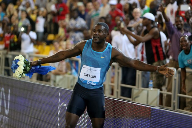 Justin Gatlin of the U.S. celebrates after winning the men's 100m at the IAAF Diamond League in the Qatari capital Doha, Friday, May 15, 2015. (AP Photo/Osama Faisal)