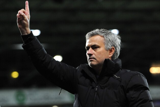 Chelsea manager Jose Mourinho gestures to supporters after the English Premier League soccer match between West Bromwich Albion and Chelsea at the Hawthorns, West Bromwich, England, Monday, May 18, 2015. (AP Photo/Rui Vieira)
