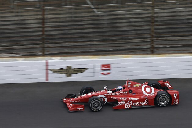 Scott Dixon, of New Zealand, steers his car during practice for the Indianapolis 500 auto race at Indianapolis Motor Speedway in Indianapolis, Monday, May 18, 2015.  (AP Photo/Darron Cummings)