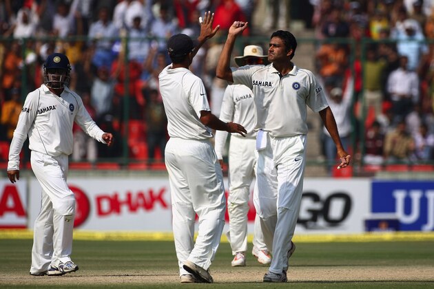 NEW DELHI, INDIA - NOVEMBER 01:  Anil Kumble of India (R) celebrates with Rahul Dravid (L) after capturing the wicket of Brad Haddinduring day four of the Third Test match between India and Australia at the Feroz Shah Kotla Stadium on November1,2008 in New Delhi,India.  (Photo by Michael Steele/Getty Images)