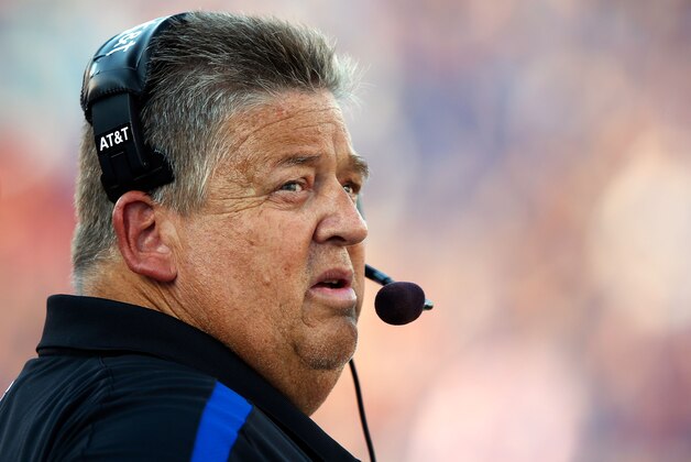 LAWRENCE, KS - SEPTEMBER 01:  Head coach Charlie Weis of the Kansas Jayhawks watches from the sidelines during the game against the South Dakota State Jackrabbits at Memorial Stadium on September 1, 2012 in Lawrence, Kansas.  (Photo by Jamie Squire/Getty Images)