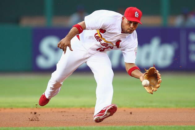 ST. LOUIS, MO - JULY 20: Rafael Furcal #15 of the St. Louis Cardinals fields a one hopper against the Chicago Cubs at Busch Stadium on July 20, 2012 in St. Louis, Missouri.  (Photo by Dilip Vishwanat/Getty Images)