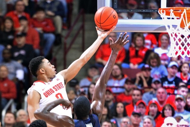 COLUMBUS, OH - JANUARY 3:  D'Angelo Russell #0 of the Ohio State Buckeyes drives the lane to lay in two points in the first half over Nnanna Egwu #32 of the Illinois Fighting Illini on January 3, 2015 at Value City Arena in Columbus, Ohio.  (Photo by Jamie Sabau/Getty Images)
