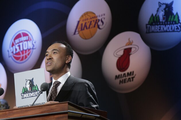 NBA Deputy Commissioner Mark Tatum announces the Minnesota Timberwolves as the winner of the top pick, during the NBA basketball draft lottery, Tuesday, May 19, 2015, in New York. (AP Photo/Julie Jacobson)