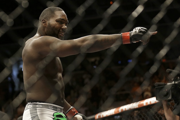 Anthony Johnson celebrates after beating Antonio Rogerio Nogueira by technical knockout during the first round of a light heavyweight mixed martial arts bout at a UFC on Fox event in San Jose, Calif., Saturday, July 26, 2014. (AP Photo/Jeff Chiu)