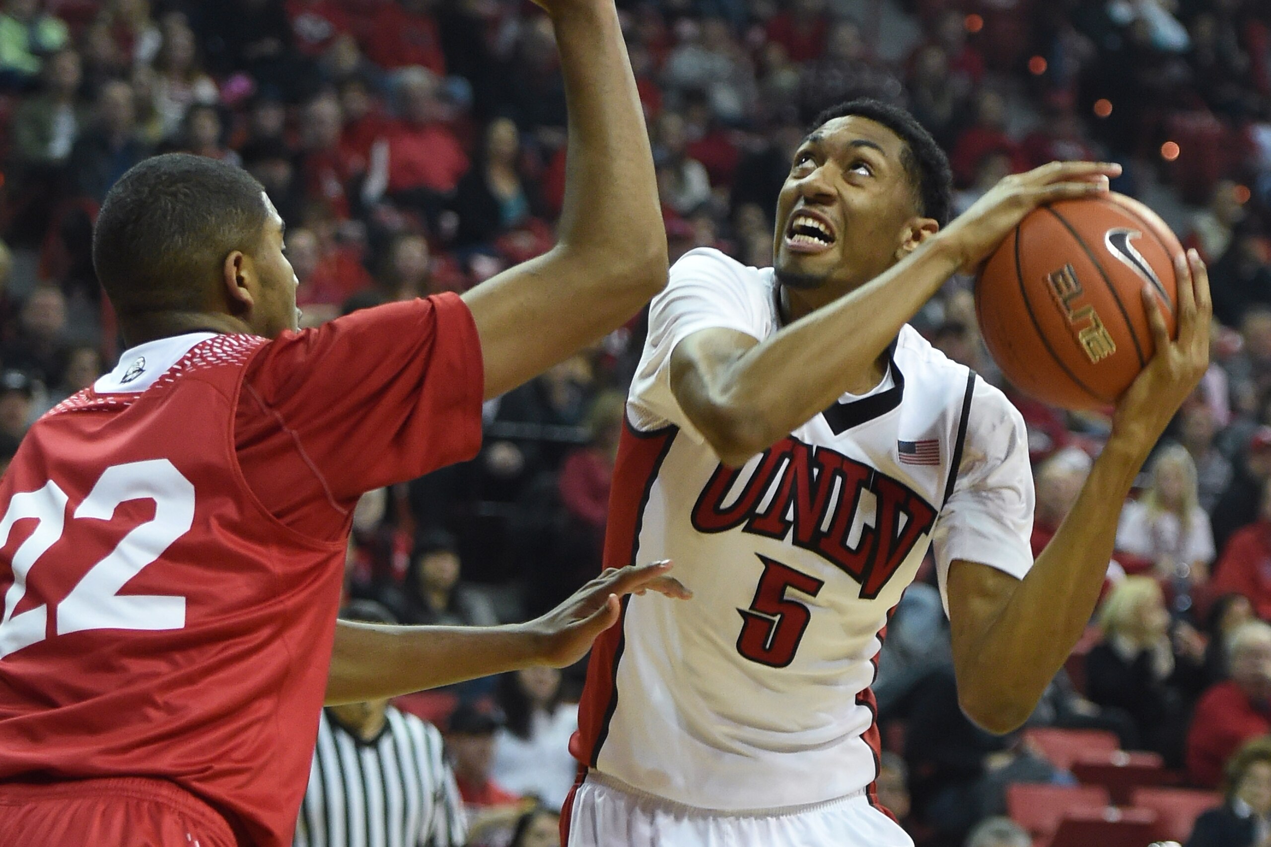 LAS VEGAS, NV - DECEMBER 27: Christian Wood #5 of the UNLV Rebels drives against Sherron Wilson #22 of the Southern Utah Thunderbirds during their game at the Thomas & Mack Center on December 27, 2014 in Las Vegas, Nevada. (Photo by Ethan Miller/Getty Images) LAS VEGAS, NV - DECEMBER 27: Christian Wood #5 of the UNLV Rebels drives against Sherron Wilson #22 of the Southern Utah Thunderbirds during their game at the Thomas & Mack Center on December 27, 2014 in Las Vegas, Nevada. (Photo by Ethan Miller/Getty Images)