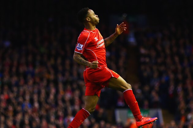 LIVERPOOL, ENGLAND - APRIL 13:  Raheem Sterling of Liverpool celebrates as he scores their first goal during the Barclays Premier League match between Liverpool and Newcastle United at Anfield on April 13, 2015 in Liverpool, England.  (Photo by Clive Brunskill/Getty Images)