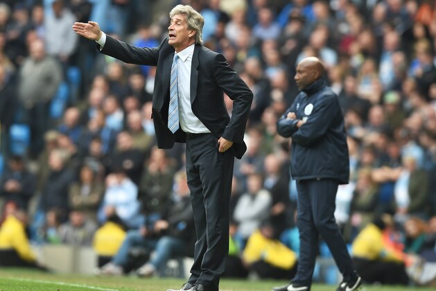 MANCHESTER, ENGLAND - MAY 10:  Manuel Pellegrini the manager of Manchester City directs his players during the Barclays Premier League match between Manchester City and Queens Park Rangers at the Etihad Stadium on May 10, 2015 in Manchester, England.  (Photo by Michael Regan/Getty Images)