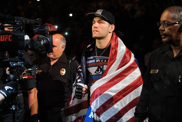 Jul 5, 2014; Las Vegas, NV, USA; Chris Weidman gets ready to enter the octagon for a middleweight title fight against Lyoto Machida at Mandalay Bay Events Center. Mandatory Credit: Stephen R. Sylvanie-USA TODAY Sports