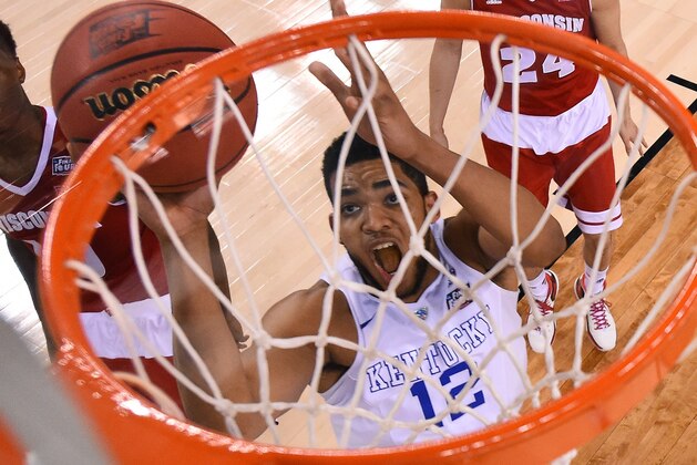Kentucky's Karl-Anthony Towns drives to the basket during the second half of the NCAA Final Four tournament college basketball semifinal game against Wisconsin Saturday, April 4, 2015, in Indianapolis. (AP Photo/Chris Steppig, Pool)