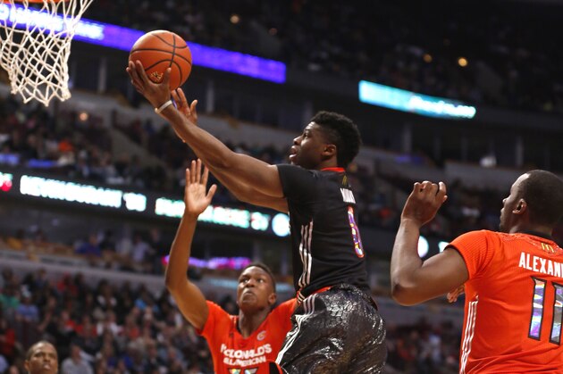 McDonald's West All-American Emmanuel Mudiay (0) shoots a layup during the first half of the McDonald's All-American boy's basketball game Wednesday, April 2, 2014, in Chicago.  (AP Photo/Charles Rex Arbogast)