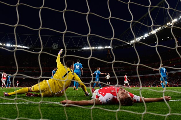 LONDON, ENGLAND - MAY 20:  Olivier Giroud of Arsenal reacts after a missed chance during the Barclays Premier League match between Arsenal and Sunderland at Emirates Stadium on May 20, 2015 in London, England.  (Photo by Mike Hewitt/Getty Images)