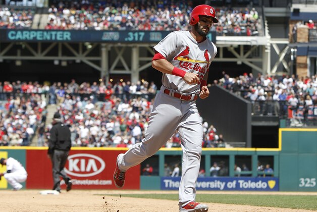 CLEVELAND, OH - MAY 14: Matt Carpenter #13 of the St. Louis Cardinals rounds the bases after hitting a two-run home run against the Cleveland Indians in the eighth inning on May 14, 2015 at Progressive Field in Cleveland, Ohio. The Cardinals defeated the Indians 2-1.  (Photo by David Maxwell/Getty Images)