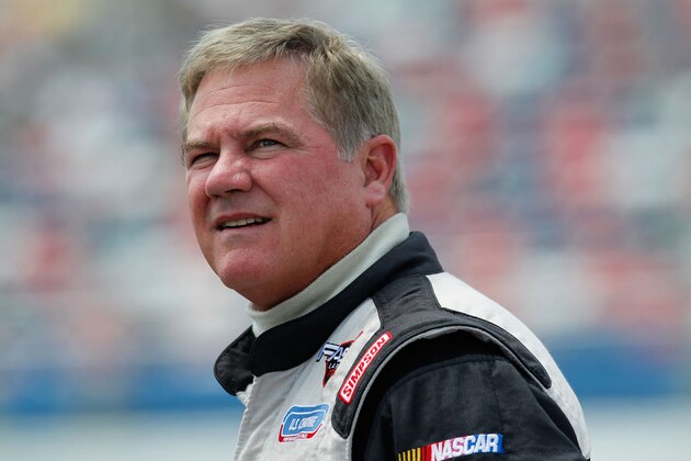 TALLADEGA, AL - MAY 05:  Terry Labonte, driver of the #32 C&J Energy Ford, stands on the grid during qualifying for the NASCAR Sprint Cup Series Aaron's 499 at Talladega Superspeedway on May 5, 2012 in Talladega, Alabama.  (Photo by Tyler Barrick/Getty Images)