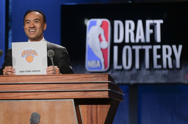 NBA Deputy Commissioner Mark Tatum announces that the New York Knicks have the fourth pick in the draft, during the NBA basketball draft lottery, Tuesday, May 19, 2015, in New York. (AP Photo/Julie Jacobson)