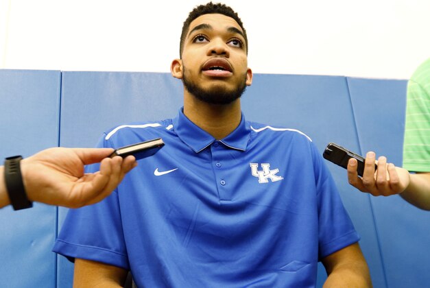 Kentucky NCAA college basketball player Karl-Anthony Towns speaks to reporters after announcing his intent to place his name in the NBA draft during a news conference at the Joe Craft Center, Thursday, April 9, 2015, in Lexington, Ky. (AP Photo/James Crisp)