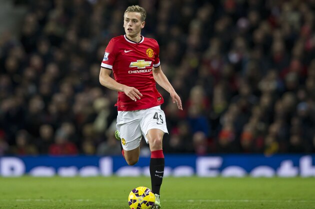 Manchester United's James Wilson during the English Premier League soccer match between Manchester United and Stoke City at Old Trafford Stadium, Manchester, England, Tuesday Dec. 2, 2014. (AP Photo/Jon Super)