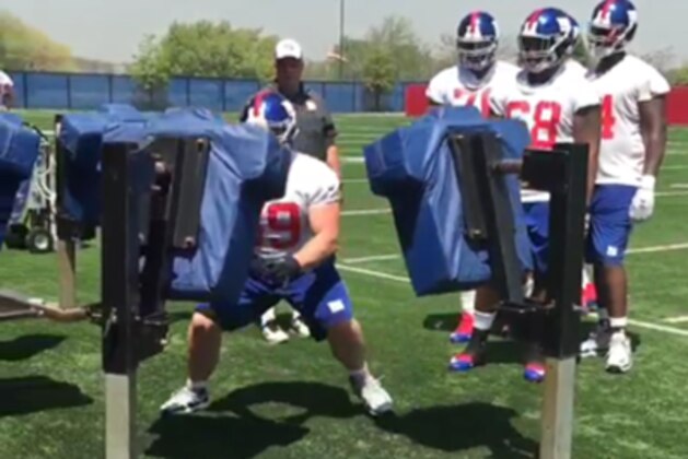 Brett Jones works the blocking sled.