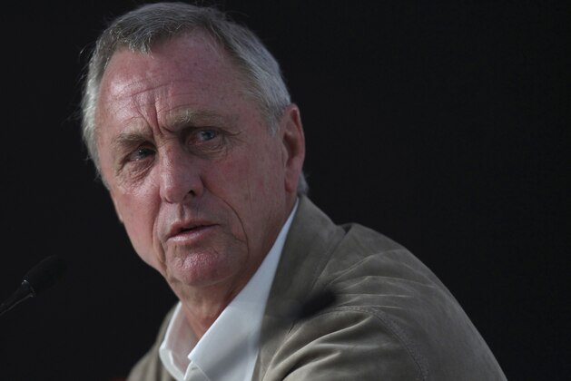 Johan Cruyff, the Dutch great who once coached Barcelona Club, pauses during his presentation as the new advisor for the Chivas de Guadalajara team at the Omnilife stadium in Guadalajara, Mexico, Saturday Feb. 25, 2012. 2012. Cruyff, 64, was introduced at a new conference where the team owner said Cruyff received a three-year contract and would be visiting the club several times each year to oversee all facets of team development from the youth system to the first team.(AP Photo/Bruno Gonzalez)