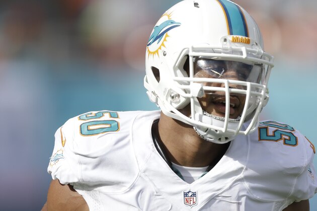 Miami Dolphins defensive end Olivier Vernon (50) runs on the field during the first half of an NFL football game against the Kansas City ChiefsSunday, Sept. 21, 2014, in Miami Gardens, Fla. (AP Photo/Wilfredo Lee)
