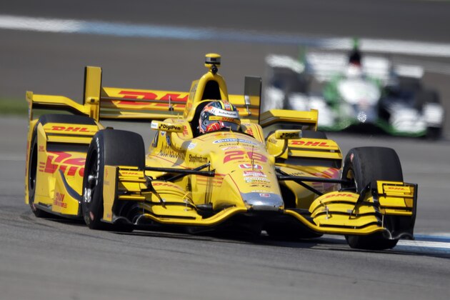 Ryan Hunter-Reay drives through a turn during practice for the Grand Prix of Indianapolis auto race at the Indianapolis Motor Speedway in Indianapolis, Thursday, May 7, 2015.  (AP Photo/Michael Conroy)