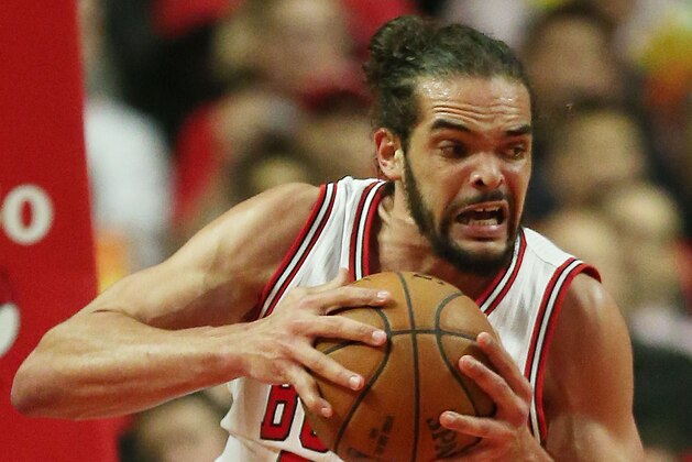 CHICAGO, IL - MAY 14:  Joakim Noah #13 of the Chicago Bulls rebounds against the Cleveland Cavaliers in the third quarter during Game Six of the Eastern Conference Semifinals of the 2015 NBA Playoffs at United Center on May 14, 2015 in Chicago, Illinois. NOTE TO USER: User expressly acknowledges and agrees that, by downloading and or using this photograph, User is consenting to the terms and conditions of the Getty Images License Agreement.  (Photo by Jonathan Daniel/Getty Images)